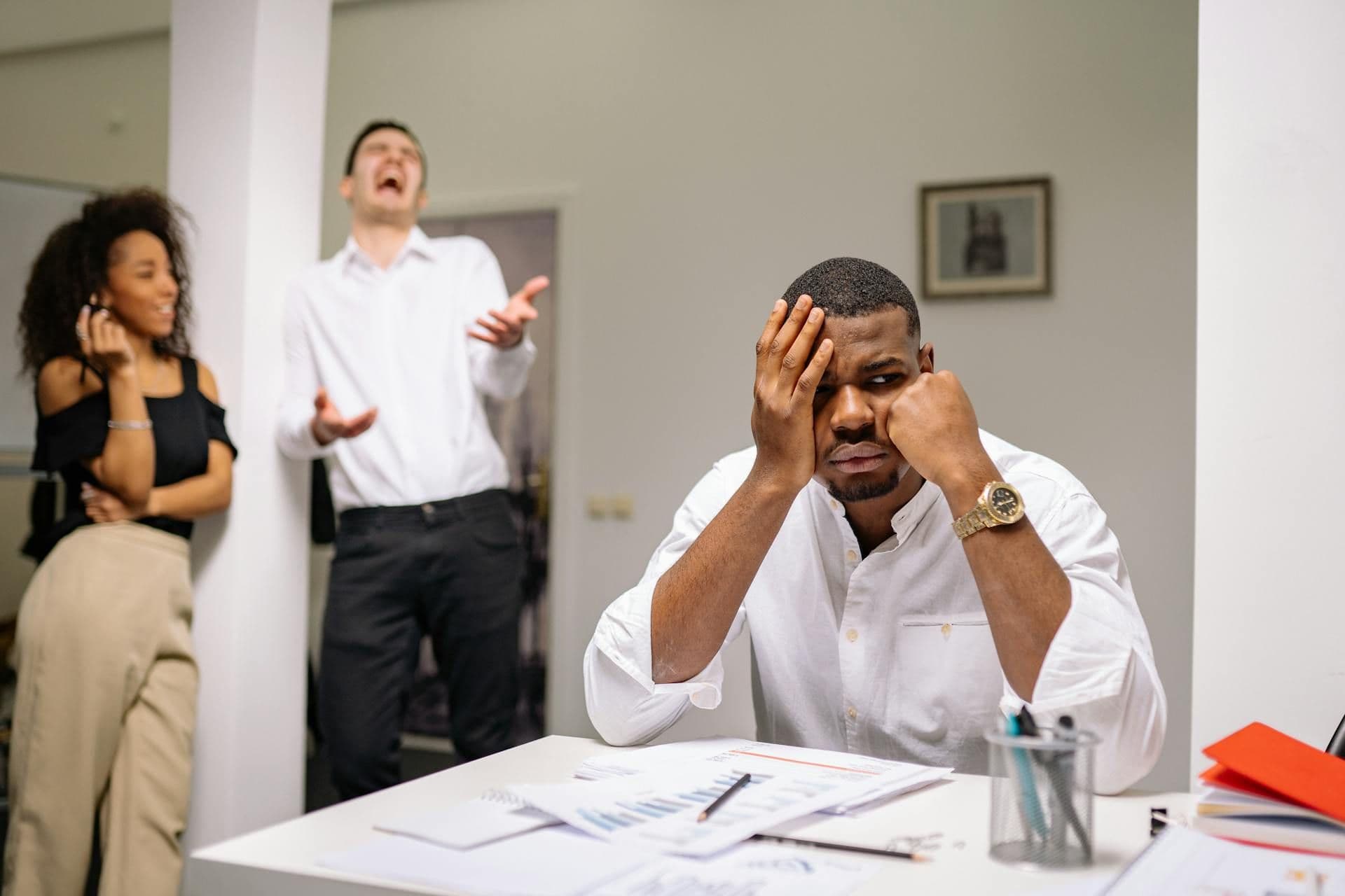 a depressed man at work