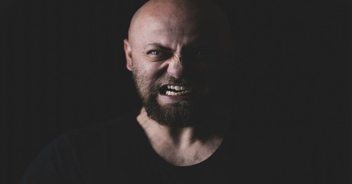 a man with an angry look