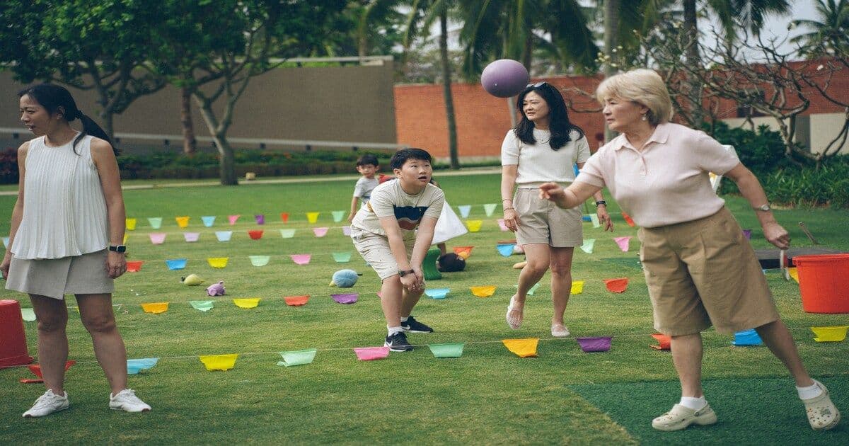 "A diverse group of adults laughing and playing together