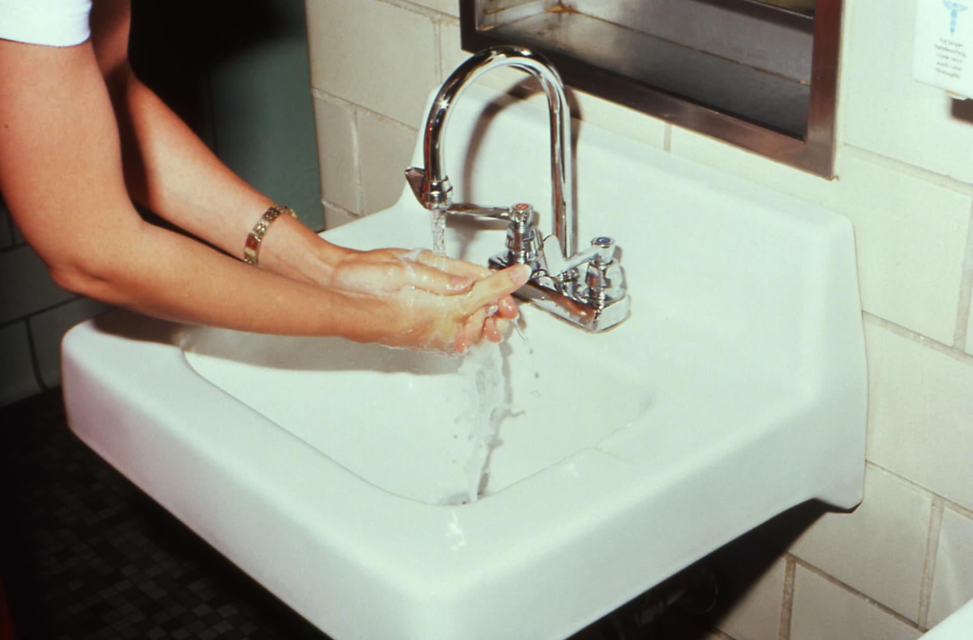 someone washing hands repeatedly